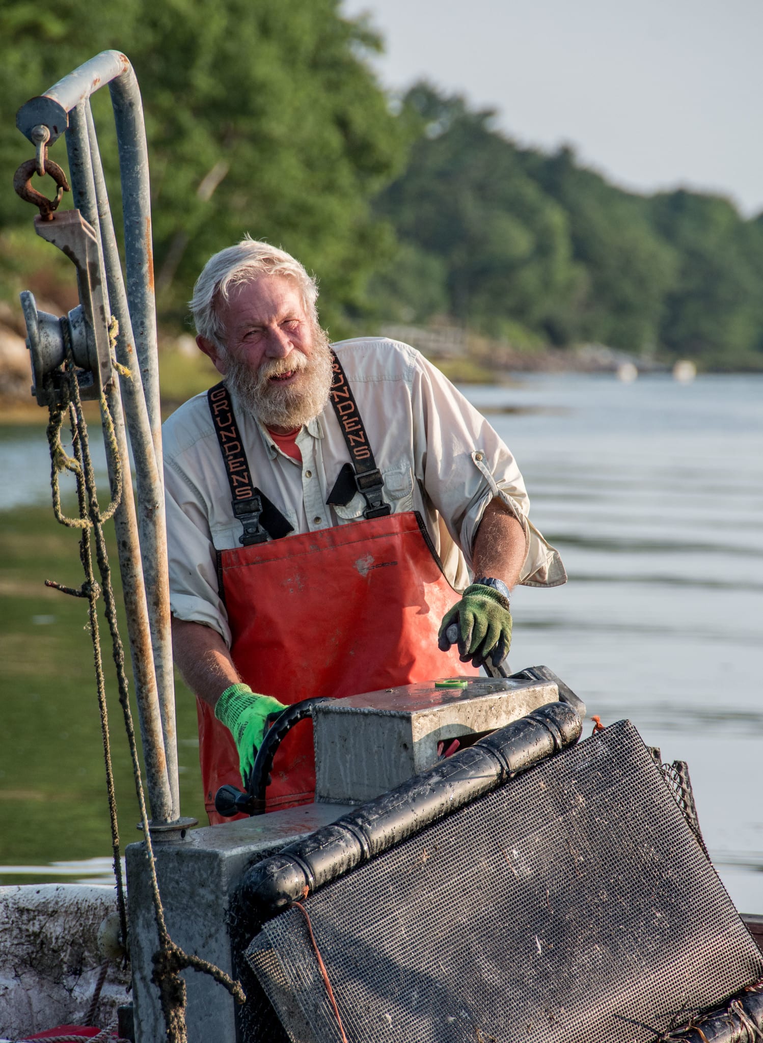 Happy Iron Island Oyster farmer in Maine.