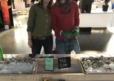 Mill Cove Oyster shucking at oyster festival in Portland Maine