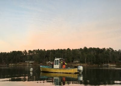 Winnegance Oyster boat at sunset in Maine